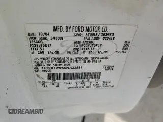 2005 Ford F-150 STX with VIN 1FTRX12W55NA33581, listed as a Copart auction lot 53717995 with 291,549 mi miles and Salvage title. Bid and sale history available at DreamBid. Image 12.
