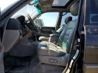 2006 Lexus LX 470 z VIN JTJHT00W264004516, wystawiony jako Copart lot #72607504 z przebiegiem 220 156 mil mil oraz Czysty tytuł • Clean title. Historia ofert i sprzedaży dostępna na DreamBid. Obrazek 7.