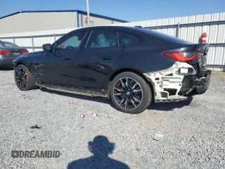 2023 BMW i4 M50 z VIN WBY33AW07PFN49265, wystawiony jako Copart lot #52011255 z przebiegiem 165 187 mil mil oraz Szkoda całkowita • Salvage title. Historia ofert i sprzedaży dostępna na DreamBid. Obrazek 2.