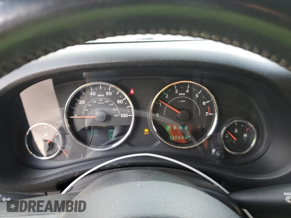 2015 Jeep Wrangler Freedom Edition with VIN 1C4AJWAG8FL688255, listed as a Copart auction lot 59722165 with 130,666 mi miles and Salvage title. Bid and sale history available at DreamBid. Image 9.