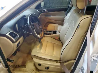 2017 Jeep Grand Cherokee Overland with VIN 1C4RJECG9HC916342, listed as a Copart auction lot 60658285 with 59,470 mi miles and Salvage title. Bid and sale history available at DreamBid. Image 7.