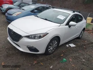 2014 Mazda Mazda3 i Sport with VIN JM1BM1U75E1130979, listed as a IAAI auction lot 41094791 with 100,518 mi miles. Bid and sale history available at carsss.com. Image 2.