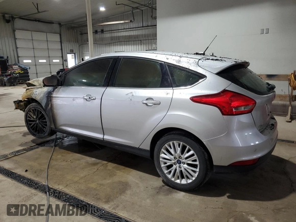 2017 Ford Focus Titanium с VIN 1FADP3N20HL274033, выставлен на аукционе Copart как лот 57295925 с пробегом Не указан миль и Списание • Salvage title. История ставок и продаж доступна на DreamBid. Изображение 2.