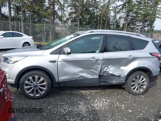 2017 Ford Escape Titanium with VIN 1FMCU9J97HUE98023, listed as a IAAI auction lot 41745843 with 24,857 mi miles. Bid and sale history available at carsss.com. Image 13.