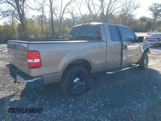 2005 Ford F-150 XLT with VIN 1FTPX12555NB05846, listed as a IAAI auction lot 41857253 with 226,219 mi miles. Bid and sale history available at carsss.com. Image 4.