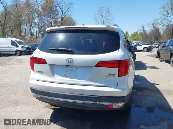 2016 Honda Pilot Touring with VIN 5FNYF6H9XGB005516, listed as a IAAI auction lot 41975049 with 85,217 mi miles. Bid and sale history available at carsss.com. Image 17.