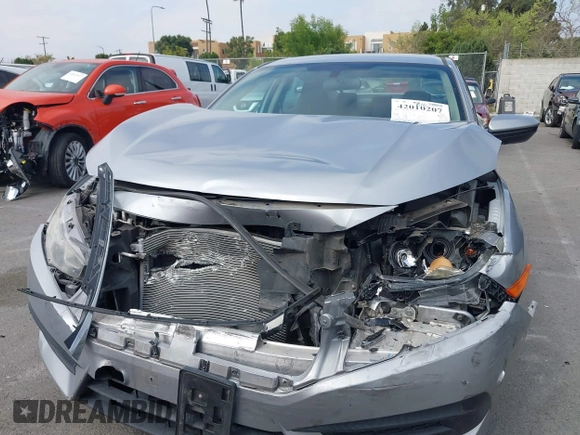 2017 Honda Civic LX with VIN 2HGFC2F5XHH562089, listed as a IAAI auction lot 42010207 with 99,809 mi miles and . Bid and sale history available at DreamBid. Image 12.