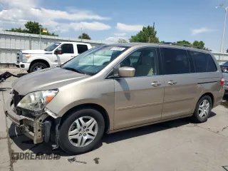 2006 Honda Odyssey EX with VIN 5FNRL38426B401762, listed as a Copart auction lot 61018525 with 145,370 mi miles and Salvage title. Bid and sale history available at DreamBid. Image 1.