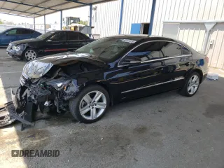 2014 Volkswagen CC Sport with VIN WVWBP7AN0EE533208, listed as a Copart auction lot 60157615 with 63,359 mi miles and Salvage title. Bid and sale history available at DreamBid. Image 1.