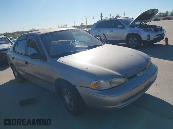 2001 Chevrolet Prizm with VIN 1Y1SK54811Z411948, listed as a IAAI auction lot 40874344 with 1 mi miles. Bid and sale history available at carsss.com. Image 1.