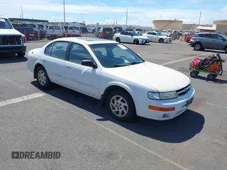 1998 Nissan Maxima GXE z VIN JN1CA21D6WT510015, wystawiony jako IAAI lot #42004731 z przebiegiem 114 575 mil mil oraz . Historia ofert i sprzedaży dostępna na DreamBid. Obrazek 1.