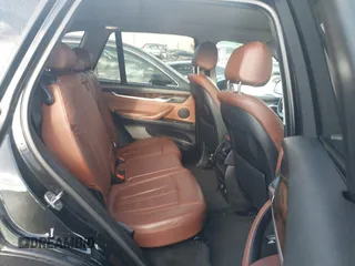 2014 BMW X5 sDrive35i with VIN 5UXKR2C50E0H31926, listed as a IAAI auction lot 41838021 with 125,813 mi miles. Bid and sale history available at carsss.com. Image 8.