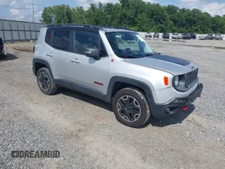 2017 Jeep Renegade Trailhawk z VIN ZACCJBCB7HPG07800, wystawiony jako IAAI lot #42476538 z przebiegiem 125 412 mil mil oraz . Historia ofert i sprzedaży dostępna na DreamBid. Obrazek 1.