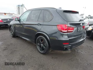 2015 BMW X5 xDrive35i z VIN 5UXKR0C59F0K65982, wystawiony jako IAAI lot #41827942 z przebiegiem 81 019 mil mil oraz . Historia ofert i sprzedaży dostępna na DreamBid. Obrazek 3.