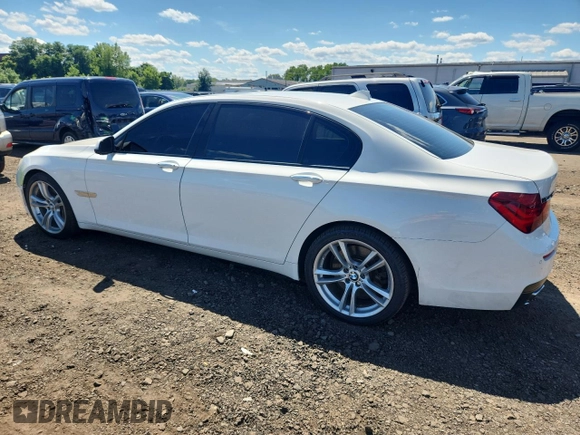 2015 BMW 7 Series 750Li with VIN WBAYE8C59FD782291, listed as a Copart auction lot 65119745 with 159,479 mi miles and Salvage title. Bid and sale history available at DreamBid. Image 2.