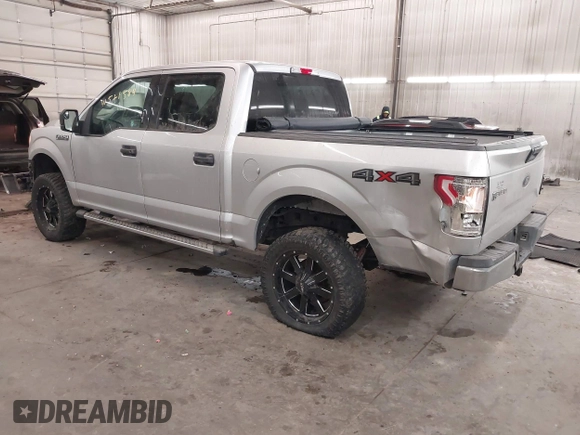 2015 Ford F-150 XLT with VIN 1FTEW1E89FFA44710, listed as a IAAI auction lot 41521584 with 158,297 mi miles. Bid and sale history available at carsss.com. Image 3.