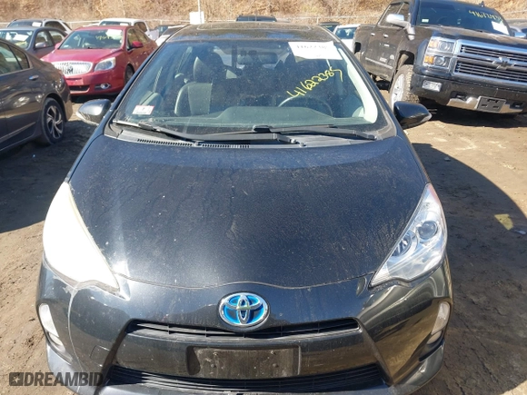 2013 Toyota Prius c One with VIN JTDKDTB36D1034076, listed as a IAAI auction lot 41622385 with 148,920 mi miles. Bid and sale history available at carsss.com. Image 12.