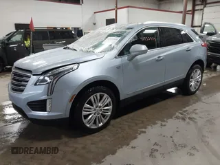 2017 Cadillac XT5 Premium Luxury AWD z VIN 1GYKNERS4HZ306955, wystawiony jako IAAI lot #41932934 z przebiegiem 150 050 mil mil oraz . Historia ofert i sprzedaży dostępna na DreamBid. Obrazek 2.
