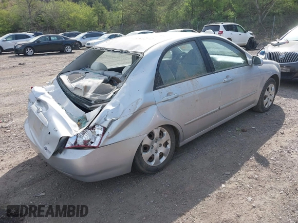 2005 Kia Spectra LX with VIN KNAFE121355203561, listed as a IAAI auction lot 41894533 with 32,889 mi miles. Bid and sale history available at carsss.com. Image 4.