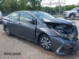 2020 Toyota Prius LE with VIN JTDKARFP5L3126789, listed as a IAAI auction lot 42559471 with 53,999 mi miles and . Bid and sale history available at DreamBid. Image 1.