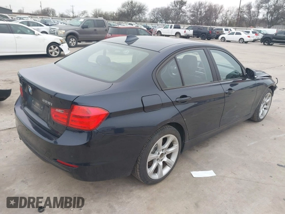 2015 BMW 3 Series 328i xDrive with VIN WBA3B3C54FJ984107, listed as a IAAI auction lot 41565829 with 98,557 mi miles and . Bid and sale history available at DreamBid. Image 4.