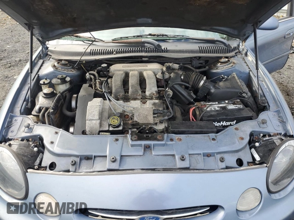 1999 Ford Taurus SE z VIN 1FAFP58S2XA261374, wystawiony jako Copart lot #74180494 z przebiegiem 193 416 mil mil oraz Szkody całkowita. Historia ofert i sprzedaży dostępna na DreamBid. Obrazek 11.