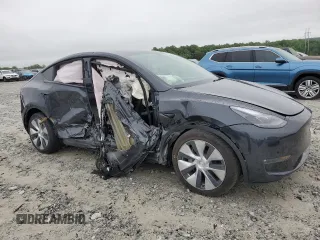 2024 Tesla Model Y Long Range with VIN 7SAYGAEE7RF005786, listed as a Copart auction lot 58415195 with 8,700 mi miles and Salvage title. Bid and sale history available at DreamBid. Image 4.