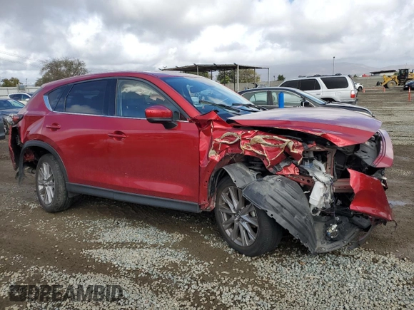 2021 Mazda CX-5 Grand Touring with VIN JM3KFADM1M1395789, listed as a Copart auction lot 45479385 with 38,179 mi miles and Salvage Title. Bid and sale history available at carsss.com. Image 4.