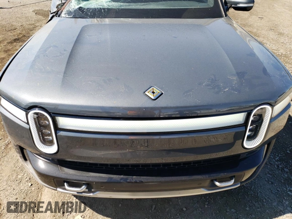 2024 Rivian R1S Adventure with VIN 7PDSGCBA1RN038230, listed as a Copart auction lot 73346304 with 0 mi miles and Salvage Title. Bid and sale history available at carsss.com. Image 14.