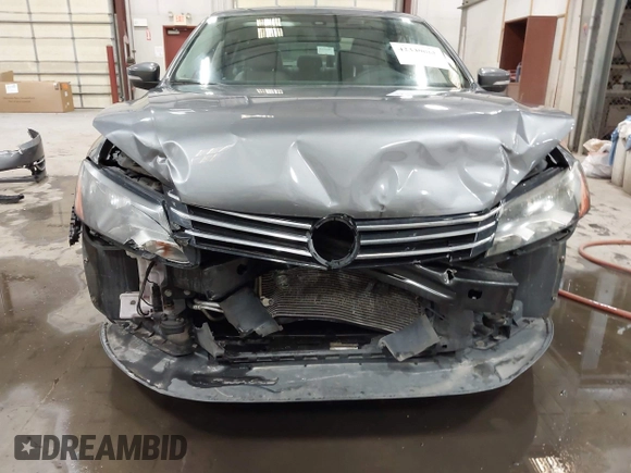 2013 Volkswagen Passat Wolfsburg Edition z VIN 1VWAH7A34DC148507, wystawiony jako IAAI lot #42339068 z przebiegiem 110 593 mil mil oraz . Historia ofert i sprzedaży dostępna na DreamBid. Obrazek 6.