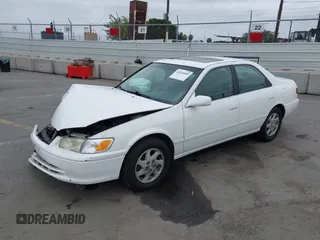 2000 Toyota Camry LE z VIN JT2BF28K3Y0289145, wystawiony jako IAAI lot #42455085 z przebiegiem 202 809 mil mil oraz . Historia ofert i sprzedaży dostępna na DreamBid. Obrazek 18.