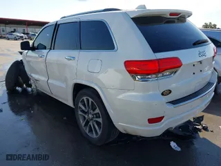 2017 Jeep Grand Cherokee Overland with VIN 1C4RJECGXHC636297, listed as a IAAI auction lot 41661922 with 111,477 mi miles. Bid and sale history available at carsss.com. Image 3.
