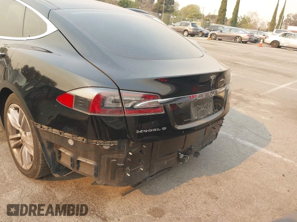 2013 Tesla Model S with VIN 5YJSA1CN3DFP06986, listed as a IAAI auction lot 41271801 with 150,307 mi miles and . Bid and sale history available at DreamBid. Image 6.