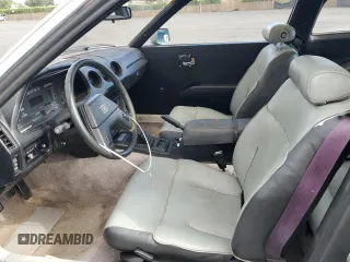 1983 Datsun 280ZX z VIN JN1CZ06S1DX700637, wystawiony jako Copart lot #53893855 z przebiegiem 93 909 mil mil oraz Tytuł czysty. Historia ofert i sprzedaży dostępna na DreamBid. Obrazek 7.