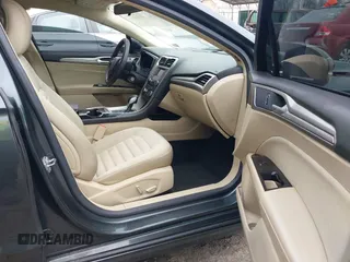 2015 Ford Fusion SE Hybrid with VIN 3FA6P0LU0FR242452, listed as a IAAI auction lot 41790218 with 163,741 mi miles. Bid and sale history available at carsss.com. Image 5.
