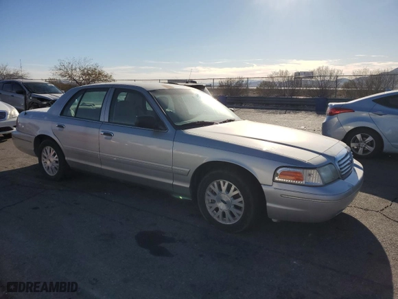2005 Ford Crown Victoria LX with VIN 2FAFP74W75X165930, listed as a Copart auction lot 81641294 with 138,521 mi miles and Clean Title. Bid and sale history available at carsss.com. Image 4.
