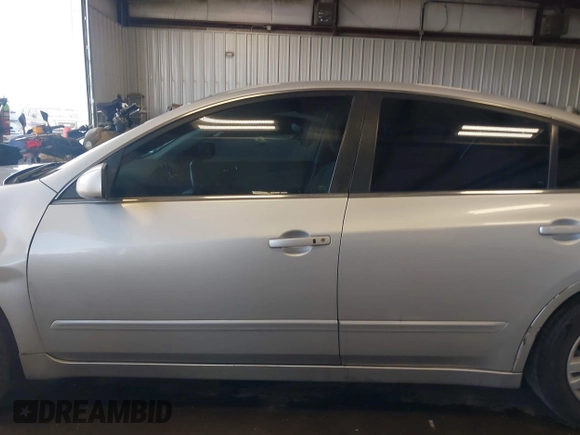 2011 Nissan Altima S with VIN 1N4AL2AP5BN448698, listed as a IAAI auction lot 42185080 with 165,297 mi miles and . Bid and sale history available at carsss.com. Image 14.