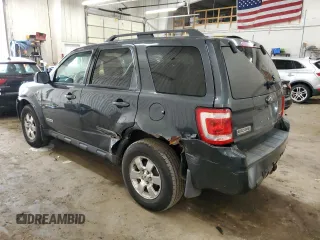 2008 Ford Escape Limited with VIN 1FMCU94128KE80966, listed as a Copart auction lot 61941815 with 141,038 mi miles and Non repairable. Bid and sale history available at DreamBid. Image 2.