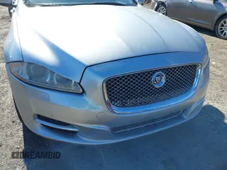 2014 Jaguar XJ z VIN SAJWJ1CD0E8V63989, wystawiony jako IAAI lot #41643513 z przebiegiem 119 924 mil mil oraz . Historia ofert i sprzedaży dostępna na DreamBid. Obrazek 19.