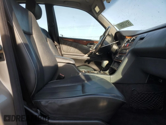 2002 Mercedes-Benz E-Class with VIN WDBJF65J22B490275, listed as a Copart auction lot 51128565 with 142,232 mi miles and Salvage Title. Bid and sale history available at carsss.com. Image 7.