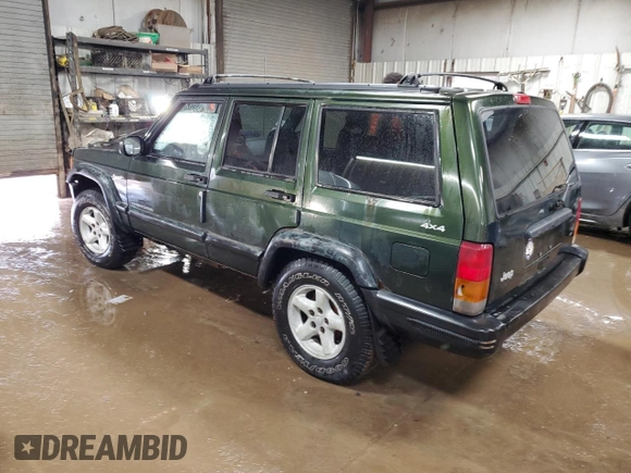 1998 Jeep Cherokee Sport with VIN 1J4FJ68S3WL146331, listed as a Copart auction lot 49420995 with 200,040 mi miles and Salvage Title. Bid and sale history available at carsss.com. Image 2.