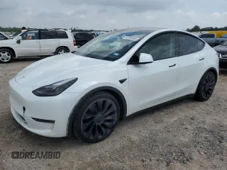 2023 Tesla Model Y Performance z VIN 7SAYGDEF2PF595192, wystawiony jako Copart lot #53756905 z przebiegiem 98 937 mil mil oraz Szkoda całkowita • Salvage title. Historia ofert i sprzedaży dostępna na DreamBid. Obrazek 1.