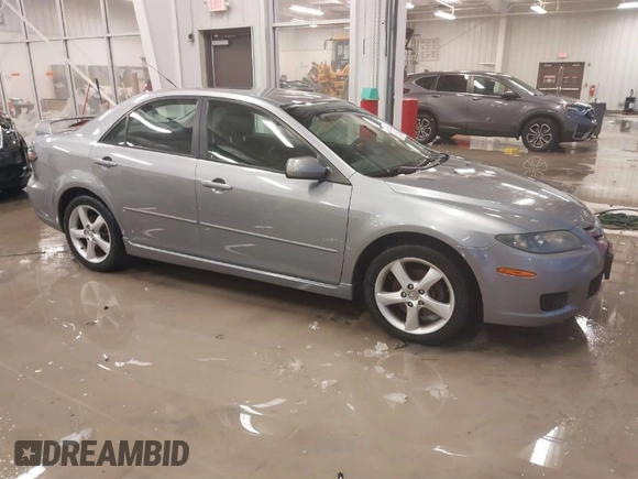 2008 Mazda 6 i Sport VE with VIN 1YVHP80C385M19167, listed as a IAAI auction lot 41282729 with 203,185 mi miles. Bid and sale history available at carsss.com. Image 1.
