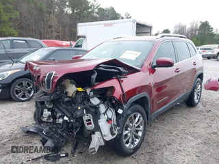 2019 Jeep Cherokee Latitude Plus with VIN 1C4PJLLBXKD278488, listed as a IAAI auction lot 41750218 with 83,203 mi miles. Bid and sale history available at carsss.com. Image 2.