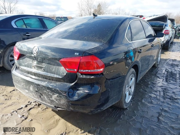 2012 Volkswagen Passat SE w/Sunroof with VIN 1VWBP7A31CC077742, listed as a IAAI auction lot 41489979 with 152,508 mi miles. Bid and sale history available at carsss.com. Image 4.