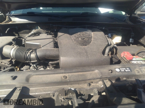 2018 Toyota Tacoma SR5 with VIN 5TFAZ5CN0JX056706, listed as a IAAI auction lot 41774141 with 31,738 mi miles and . Bid and sale history available at DreamBid. Image 10.