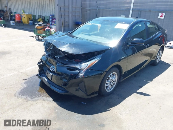 2016 Toyota Prius Four z VIN JTDKARFU7G3017018, wystawiony jako IAAI lot #42224376 z przebiegiem 74 136 mil mil oraz . Historia ofert i sprzedaży dostępna na DreamBid. Obrazek 2.
