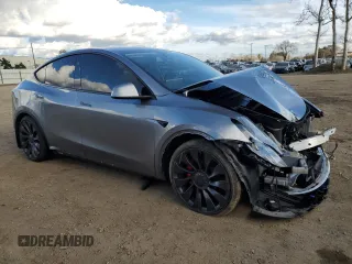 2024 Tesla Model Y Performance with VIN 7SAYGDEF2RF113873, listed as a Copart auction lot 46181915 with 19,625 mi miles and Salvage Title. Bid and sale history available at DreamBid. Image 4.