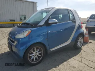 2009 Smart fortwo Pure with VIN WMEEJ31XX9K235766, listed as a Copart auction lot 54985845 with 75,708 mi miles and Clean Title. Bid and sale history available at carsss.com. Image 1.
