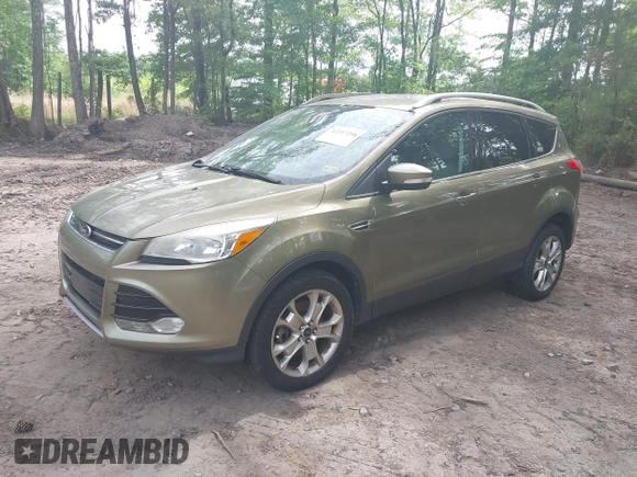 2014 Ford Escape Titanium with VIN 1FMCU9JX9EUB23972, listed as a IAAI auction lot 42217298 with 164,556 mi miles and . Bid and sale history available at DreamBid. Image 17.